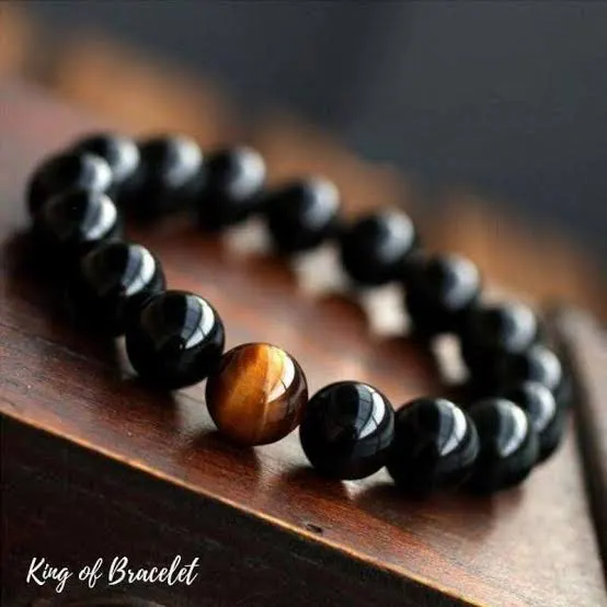 Bracelet en Onyx Noir avec perle d’Œil de Tigre – Ancrage & Force Intérieure